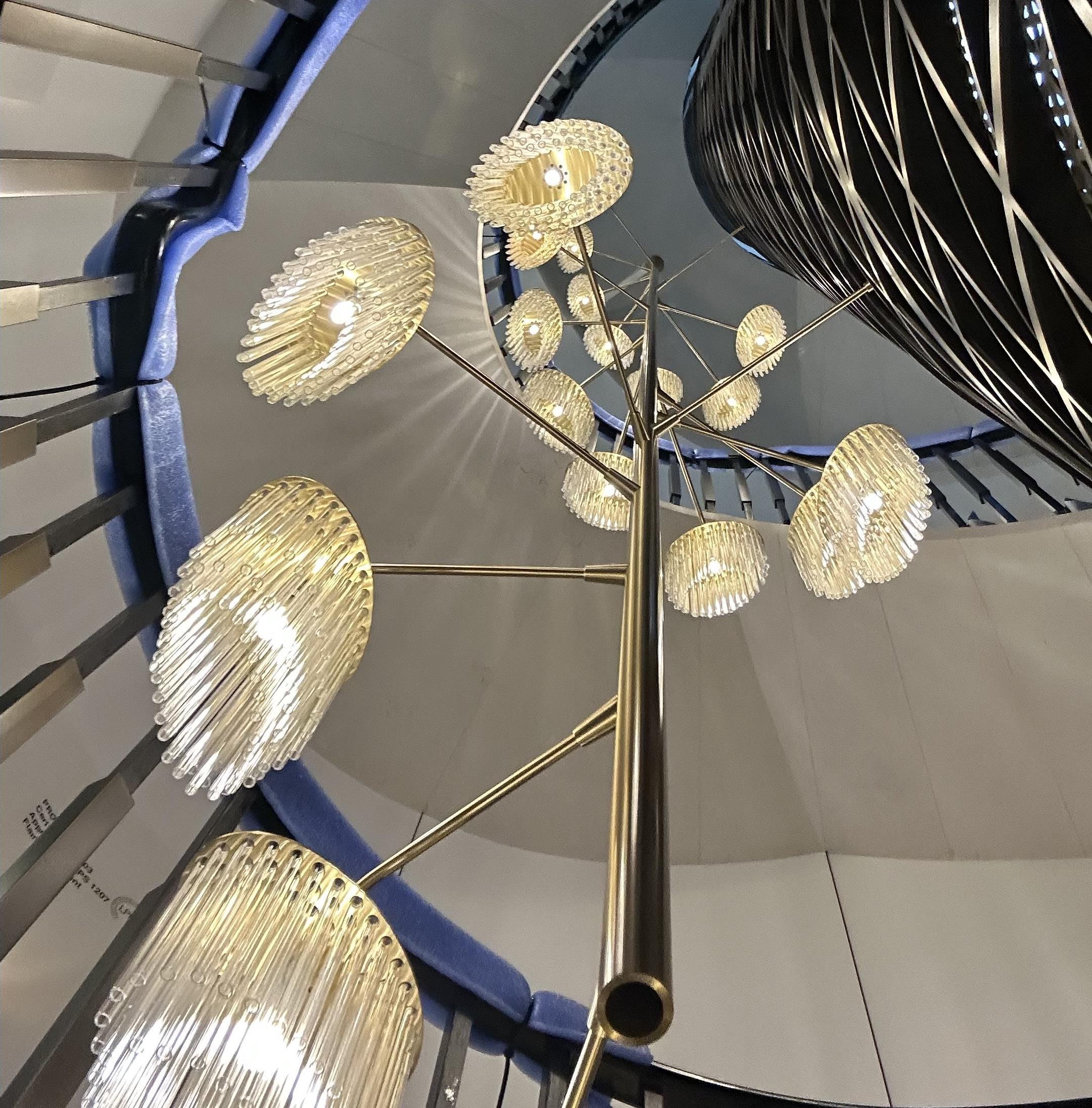 A contemporary stairwell chandelier by Baroncelli